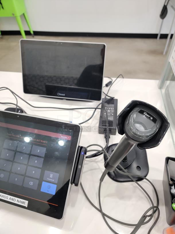 Complete Toast POS system with touchscreen display, card reader, and barcode scanner, ideal for businesses. In excellent condition.