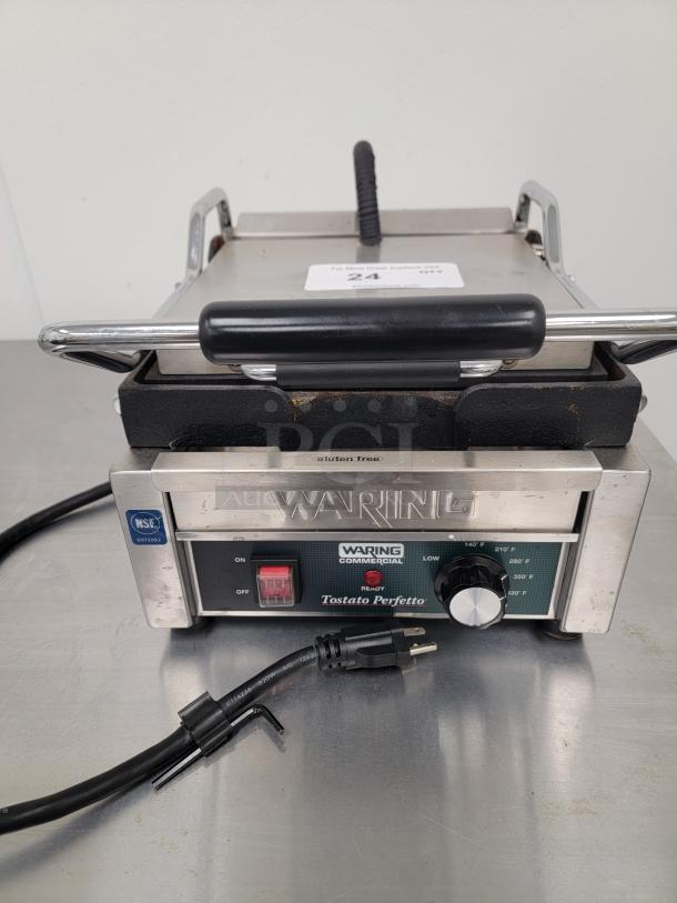 Waring Commercial Panini Grill, Model UNP0200A-161, durable build, even heating, ideal for professional kitchens.