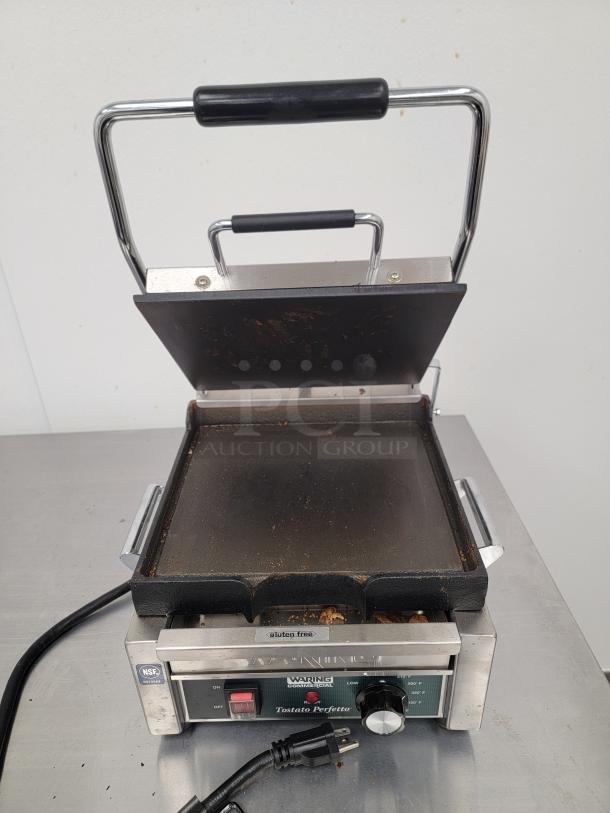 Waring Commercial Panini Grill UNP0200A-161; durable stainless steel, even heating, designed for high-demand use.