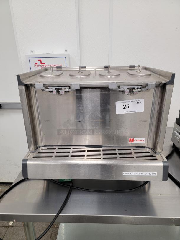 Crathco D35-4 four bowl cold beverage dispenser, stainless steel, ideal for juices and iced drinks. Auction tag visible.