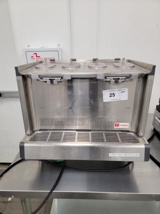 Crathco D35-4 four bowl cold beverage dispenser, stainless steel, ideal for juices and iced drinks. Auction tag visible.