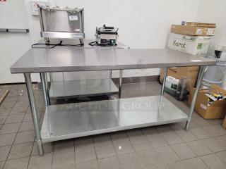 6-foot commercial stainless steel work table with undershelf, durable and versatile for kitchen or workshop use.