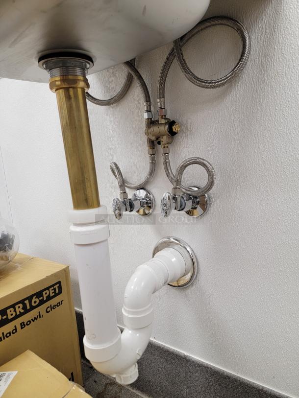 John Boos wall mount hand sink, model PBHS-W-1410-SSLR, NSF-certified, with visible plumbing connections and stainless steel finish.