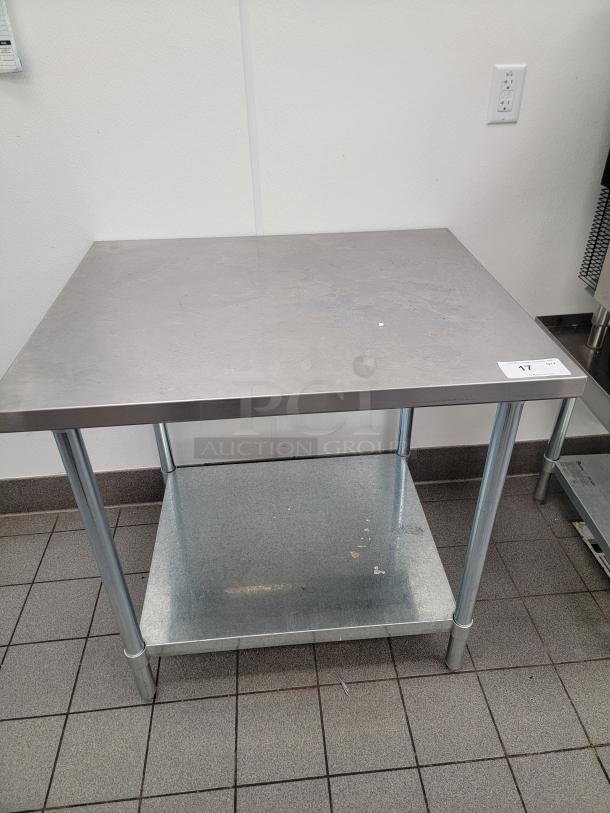 John Boos 3' stainless steel prep table, model FGLB3630, in great condition, ideal for kitchens and workshops.