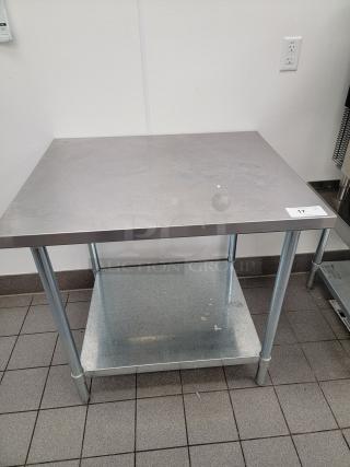 John Boos 3' stainless steel prep table, model FGLB3630. Great condition, ideal for kitchens and workshops.