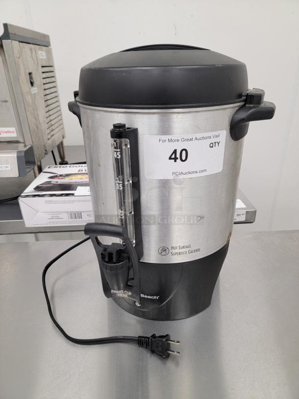 Hamilton Beach commercial coffee urn, Model 40521, large capacity, stainless steel exterior, visible liquid level gauge, plug attached.