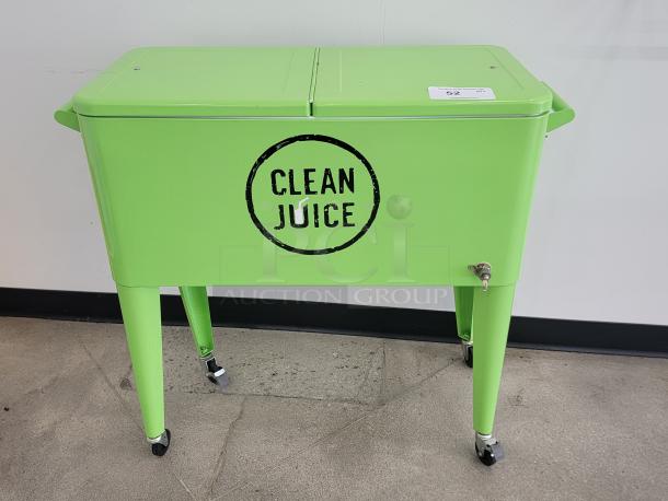 Vibrant green portable outdoor cooler with "Clean Juice" logo, large capacity, on wheels, excellent condition. Perfect for events.