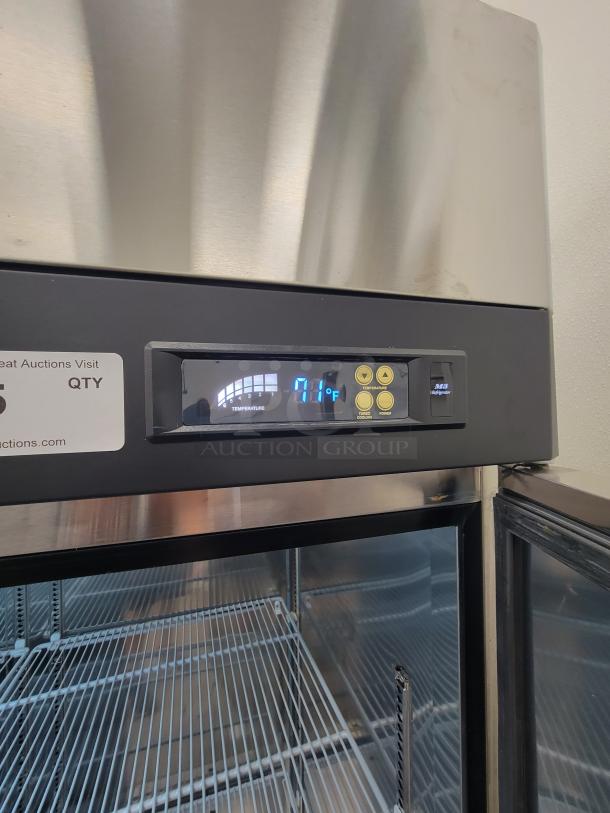 Turbo Air M3R72-3-N commercial refrigerator, 3-door, excellent condition, digital display at 71°F, interior shelving visible.