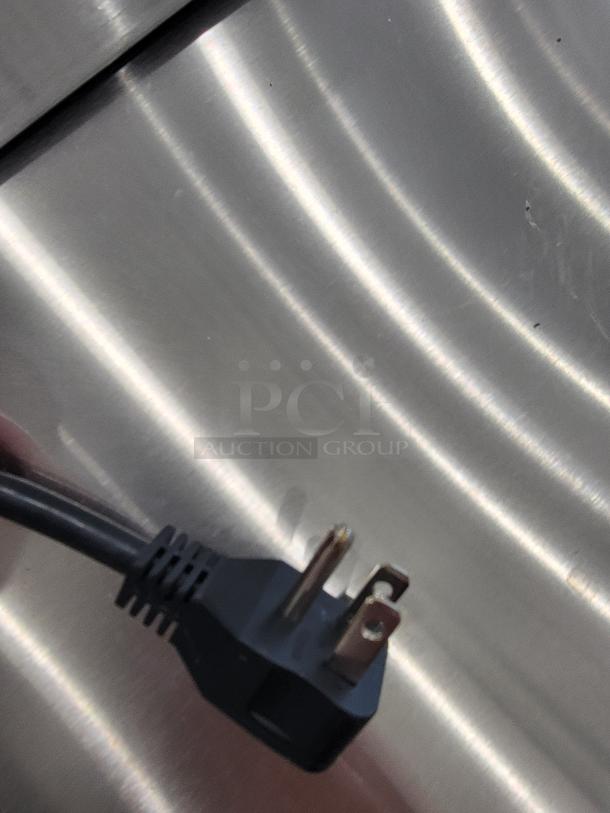 Supera PS48-MT-SI-HC prep table, power cord detail, stainless steel finish, shows pristine condition. Ideal for high-volume usage.