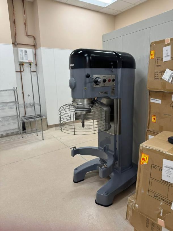 Hobart 1410, 140-quart commercial mixer in like-new condition. Includes two mixing bowls, dolly, and paddle attachment.