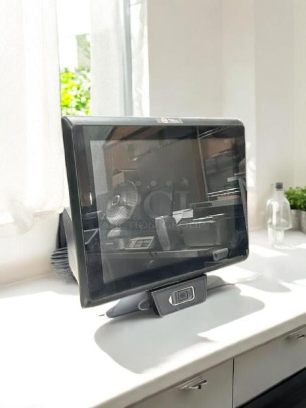 Touch Dynamic Pulse J1900 POS system in excellent condition; all-in-one setup, fully tested and working, on a countertop.
