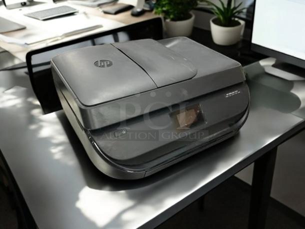 HP OfficeJet 4650 All-in-One Printer, model SDGOB-1502, in great condition on desk. Fully tested and working.