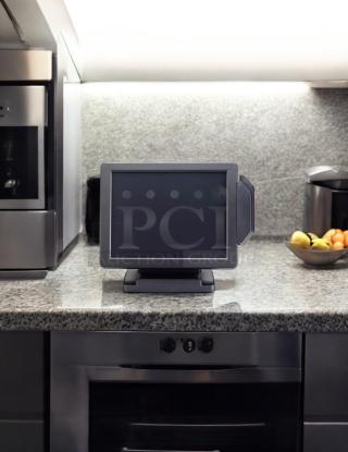 15" Sanyo AEGIS-152TA black P.O.S monitor in excellent condition, displayed on a granite countertop, fully tested and working.