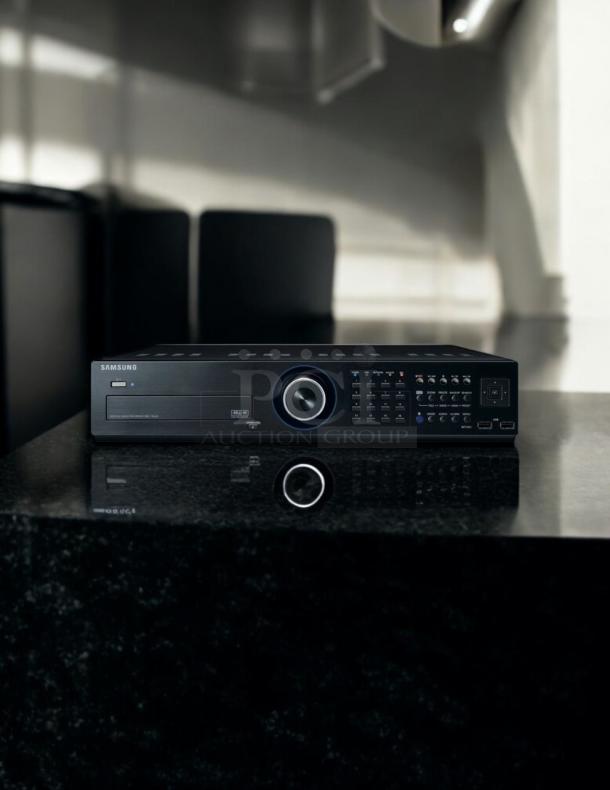 Samsung SRD-1652D DVR, 16-channel, 3TB storage, excellent condition, fully tested, front control panel, black finish.