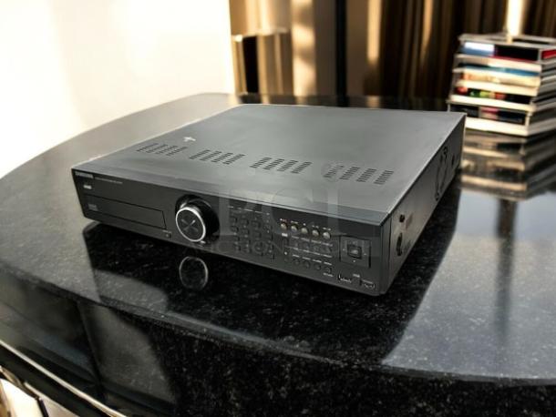 Samsung SRD-1652D DVR, 16-channel, 3TB, in excellent condition, fully tested. Front controls visible, sleek black design.