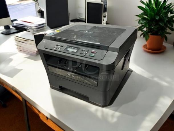 Brother HL2280DWB monochrome printer in great condition on a desk; wireless, fully tested, and working.