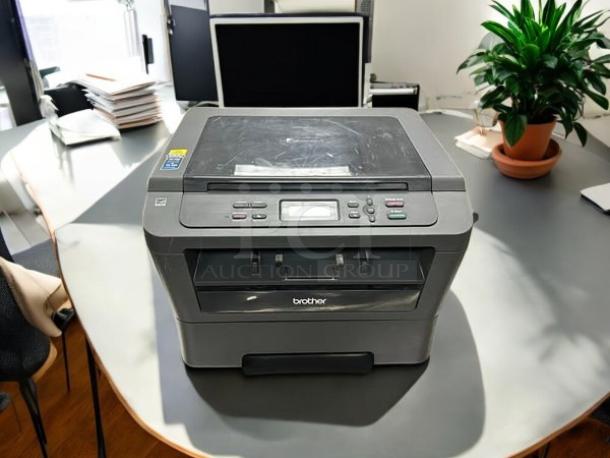 Brother HL2280DWB wireless monochrome printer in great condition, fully tested and working. Features a sleek design.