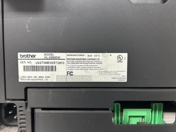 Brother HL2280DWB wireless monochrome printer, great condition, fully tested. Visible label with serial no. U62708E3N572803, manufactured May 2013.