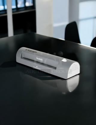 Brand new Scotch TL901X Thermal Laminator, gray, tabletop design, ideal for home or office use.