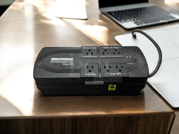 Minuteman EnSpire EN400 Standby UPS in excellent condition, featuring multiple surge and battery outlets.