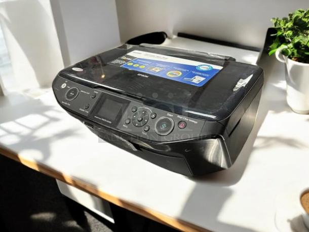 Epson Stylus Photo RX595 printer, in excellent condition, fully tested and working. Features a control panel with display.