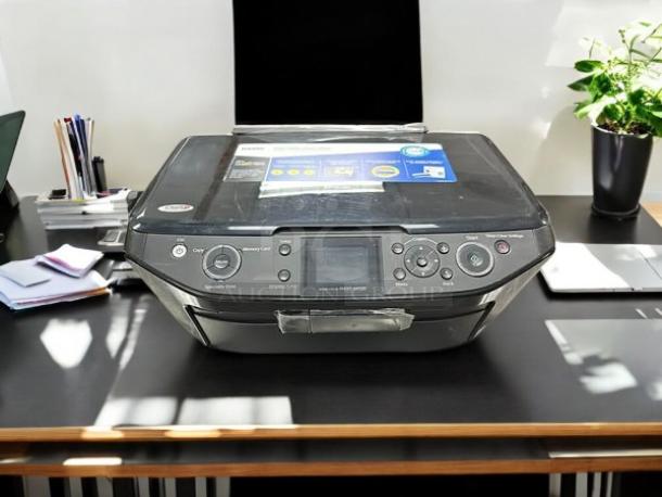 Epson Stylus Photo RX595 printer in excellent condition on a desk, showing control panel and LCD screen. Fully tested and working.