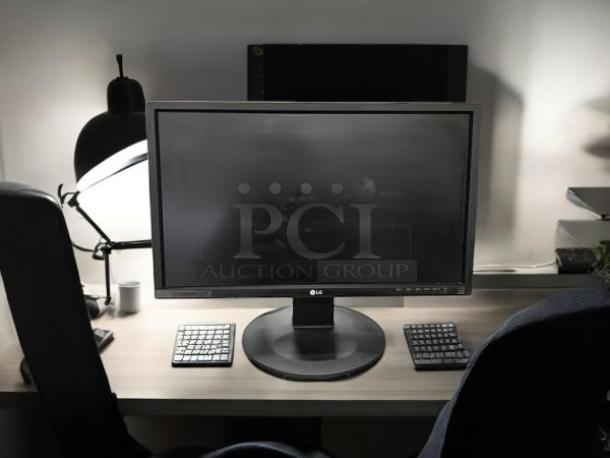 LG 22MB35PY 22" Full HD IPS LED Monitor in great condition on a desk; tested and working.