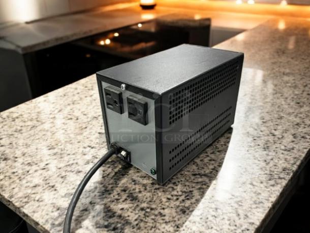 OneAC ConditionOne PC075A power line conditioner, excellent condition, fully tested, features dual outlets and ventilation slots.