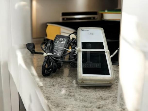 Clover Flex K400 in great condition, fully tested and working. Includes power adapter, shown on a countertop.