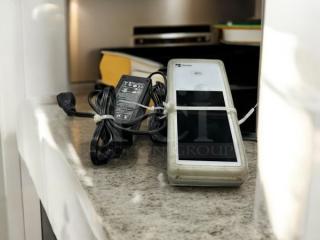 Clover Flex K400 in great condition, fully tested and working. Includes power adapter, shown on a countertop.