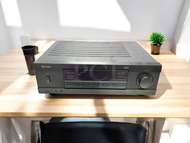 Sherwood RX-4109 200W stereo receiver in excellent condition on a desk; fully tested and functional.