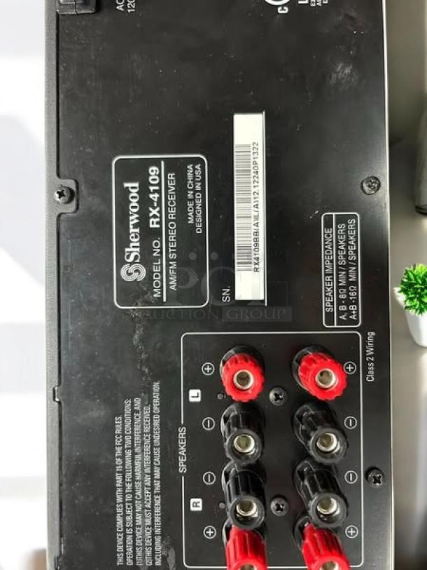 Sherwood RX-4109 200W stereo receiver, fully tested, excellent condition, visible labels and connections, rear view.