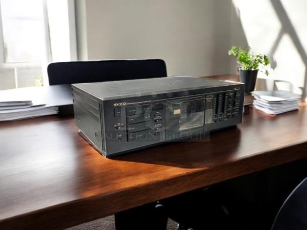 Nakamichi RX 202 autoreverse cassette deck in excellent condition, vintage 1982, fully tested and working, visible controls.