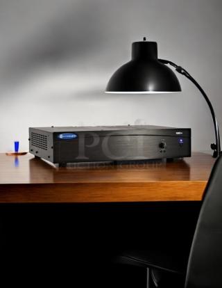 Crown 180A 80W professional power amplifier in excellent condition on wooden desk, with brand and model labels visible.
