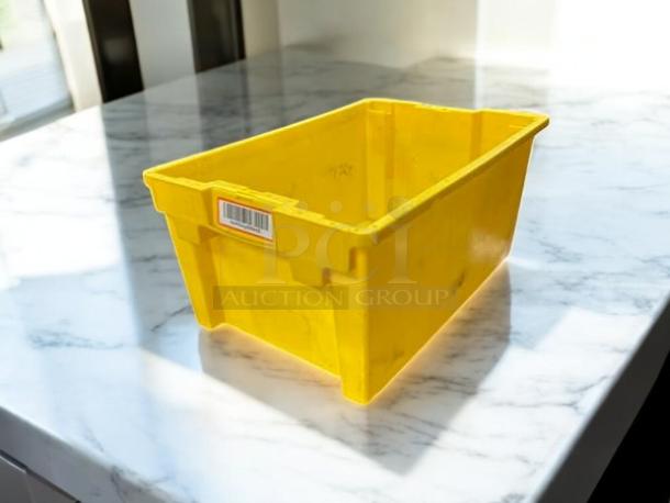 Yellow plastic storage container in great condition, rectangular shape, visible barcode label, ideal for organizing.