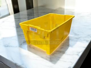 Yellow plastic storage container in great condition, rectangular shape, visible barcode label, ideal for organizing.