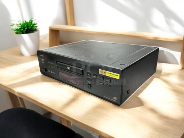Denon DVD-2800II progressive scan DVD player in excellent condition, fully tested. Features front buttons and display.