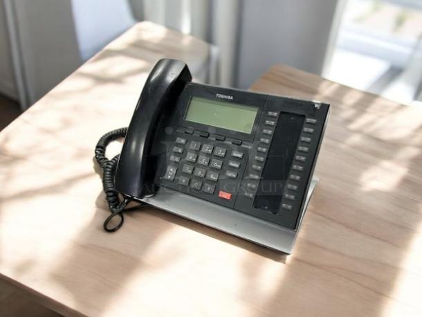 Toshiba DP5032-SD digital telephone, excellent condition, fully tested, black with keypad and display, model prominently marked.