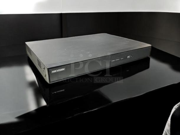 Hikvision AcuSense iDS-7208HQHI-M2/S 8-Channel DVR, great condition, fully tested, black casing with visible logo.