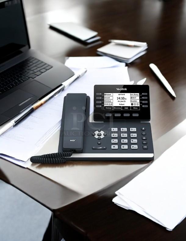 Yealink SIP-T53W desk phone with HD display, keypad, and coiled handset. Features several programmable buttons.