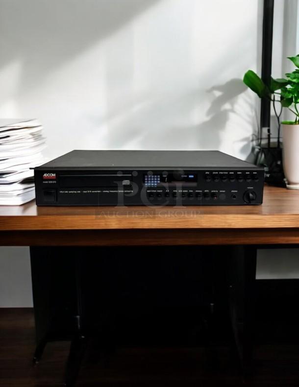 Adcom GCD-575 CD player in great condition, fully tested and working, featuring multiple control buttons and digital display.
