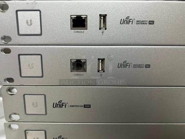 Ubiquiti UniFi Security Gateway Pro USG-PRO4 and Switch 24 250W, excellent condition, fully tested, visible ports and labels.