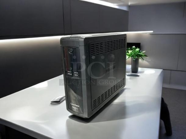 CyberPower CP1500AVRLCDTAA UPS Battery Backup, 1500VA, 900W, 12 outlets, excellent condition, black mini tower, TAA and UL certified.