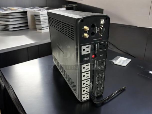 CyberPower CP1500AVRLCDTAA UPS, 1500VA, 900W, 12 outlets, excellent condition, mini tower design, TAA and UL certified.