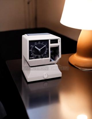 AMANO TCX-11 time clock in great condition, 6 7/8in x 8 1/4in, fully tested and working, model 4TH70.