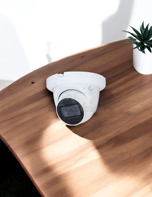Dahua HDCVI white security camera in excellent condition on wooden surface, fully tested and working.