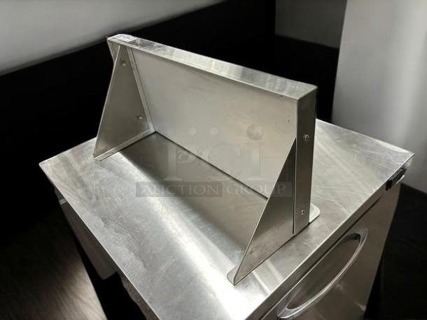 GSW W1224 24” wall mount stainless steel shelf in excellent condition, tested and functional. Durable, sleek design.