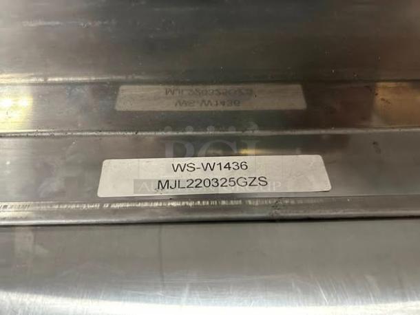 Great condition stainless steel wall mount shelf, model WS-W1436, 36” x 14”, with visible label marking, fully tested.