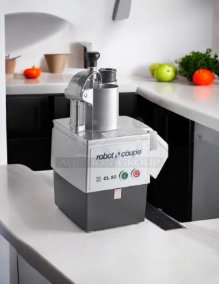 Robot Coupe CL50 food processor, perfect condition, includes 3 discs. Features 1 1/2 hp motor, tested and working.