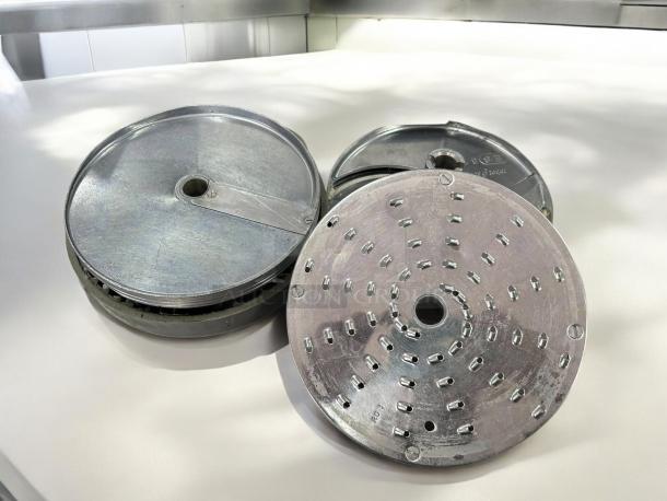 Robot Coupe CL50 food processor discs, perfect condition, three metal discs shown. Discs tested and working.